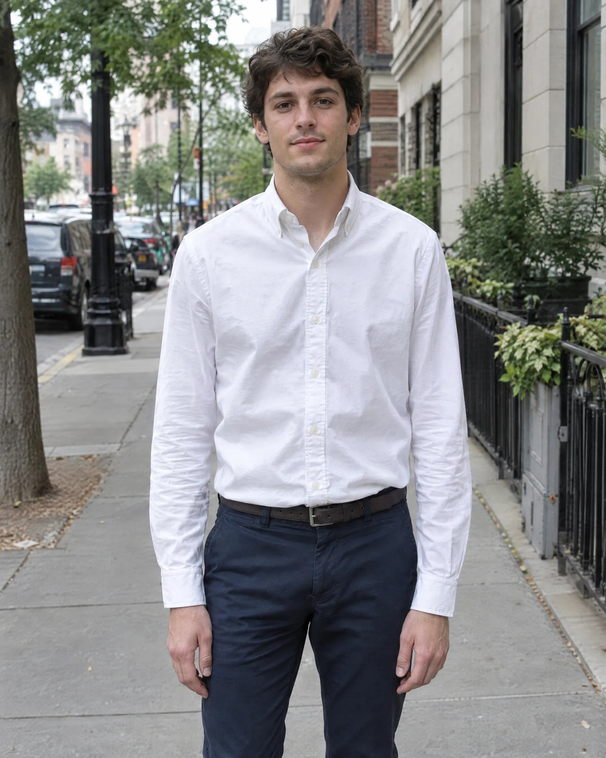 Before: man in a white oxford shirt, without the padded undershirt