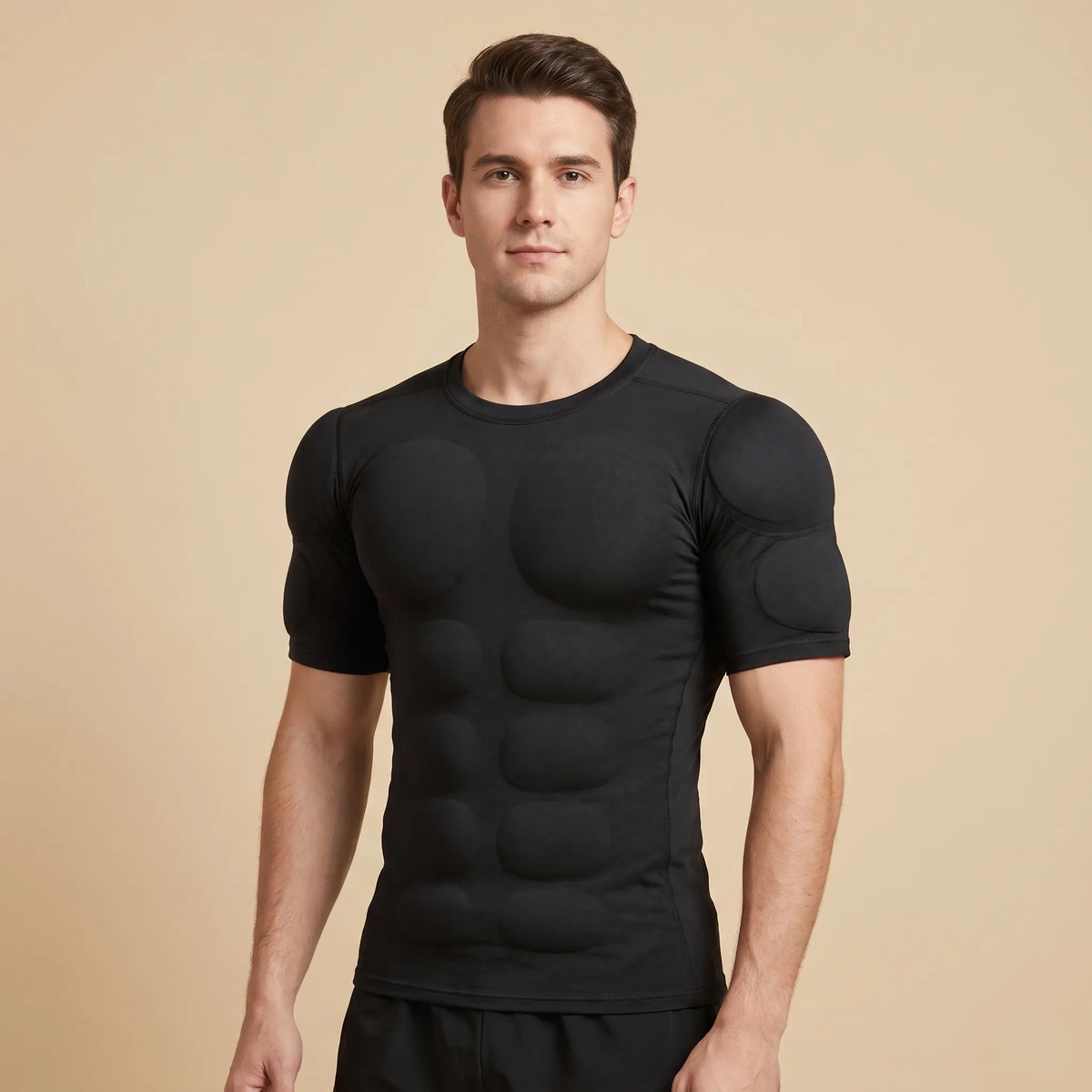 Man wearing the black V-Frame Padded Undershirt, front view