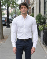 After: same man and white oxford shirt, with the V-Frame Padded Undershirt underneath
